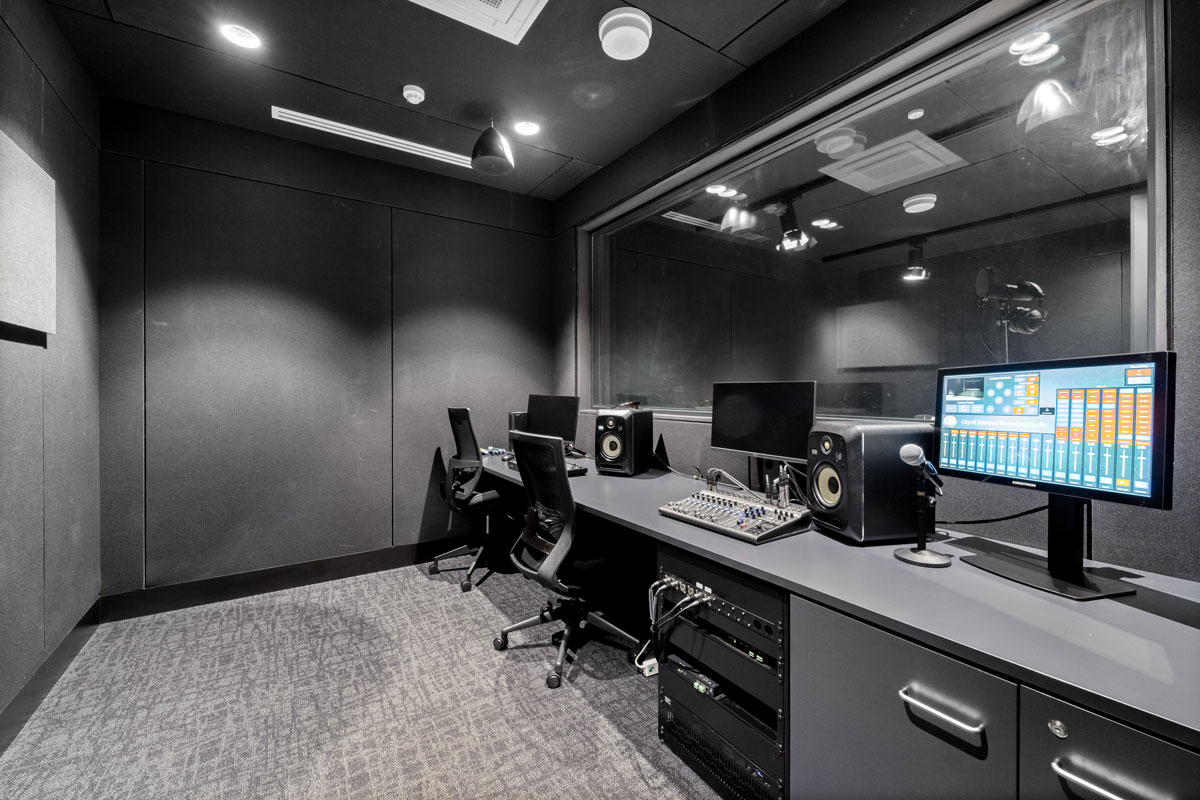 Recording studio comptuers and microphones.