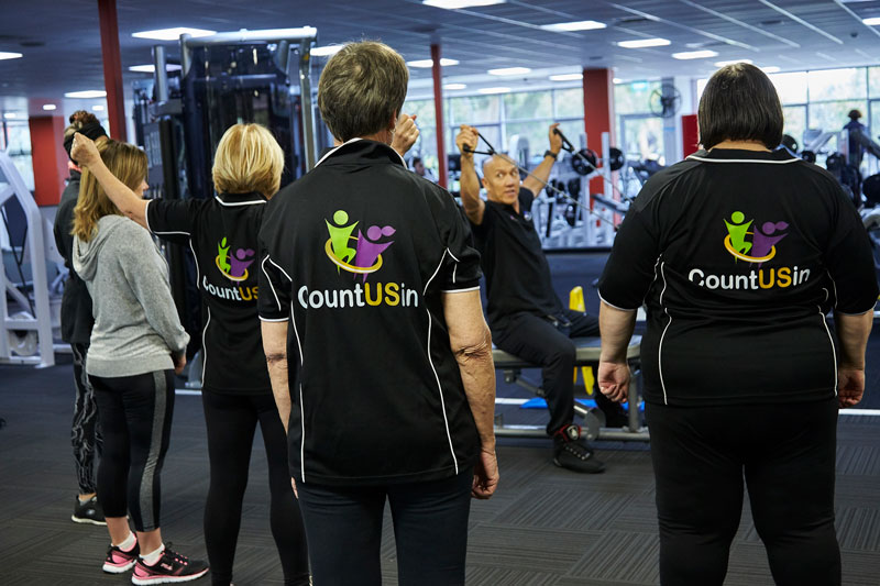 CountUSin participants paying attention to fitness instructor